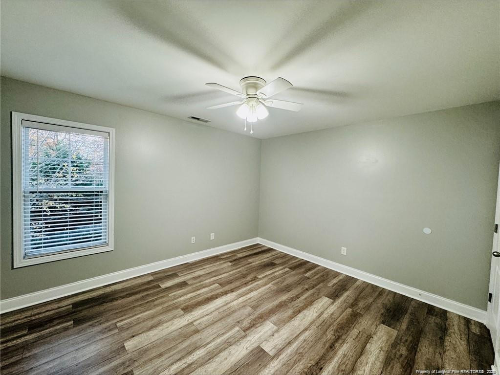 84 Old Glory Lane Cameron, NC 28326 - Photo 6 of 8 a view of a room with a ceiling fan and a window