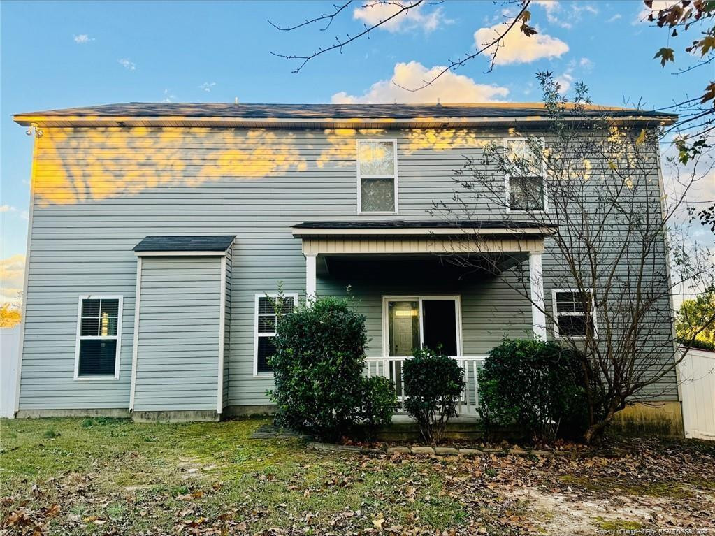 84 Old Glory Lane Cameron, NC 28326 - Photo 8 of 8 a view of a house with potted plants