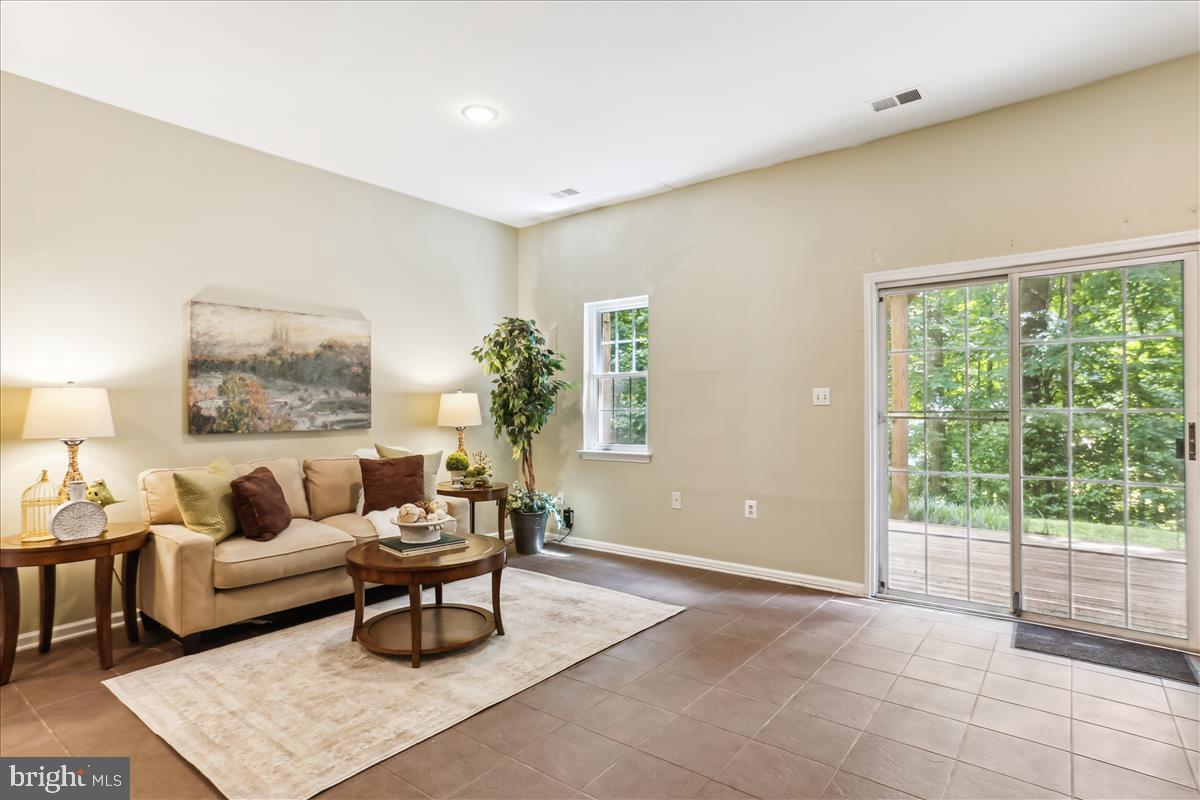 11972 Sentinel Point Court Reston, VA 20191 - Photo 26 of 45 Walk-out lower level rec room