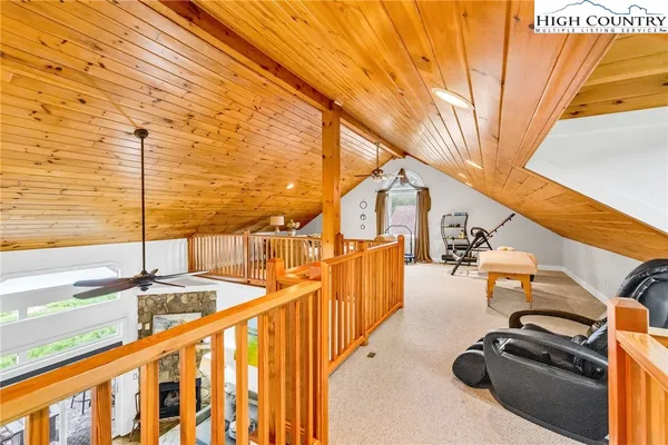 a view of a balcony with chairs