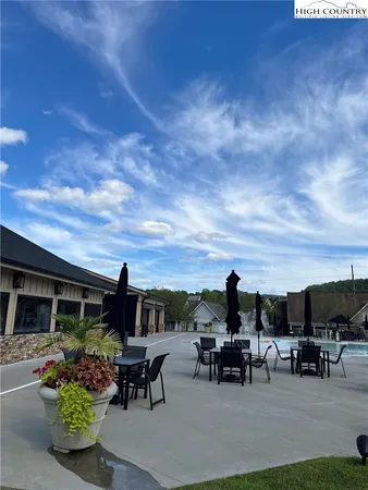 a view of a terrace with sitting area