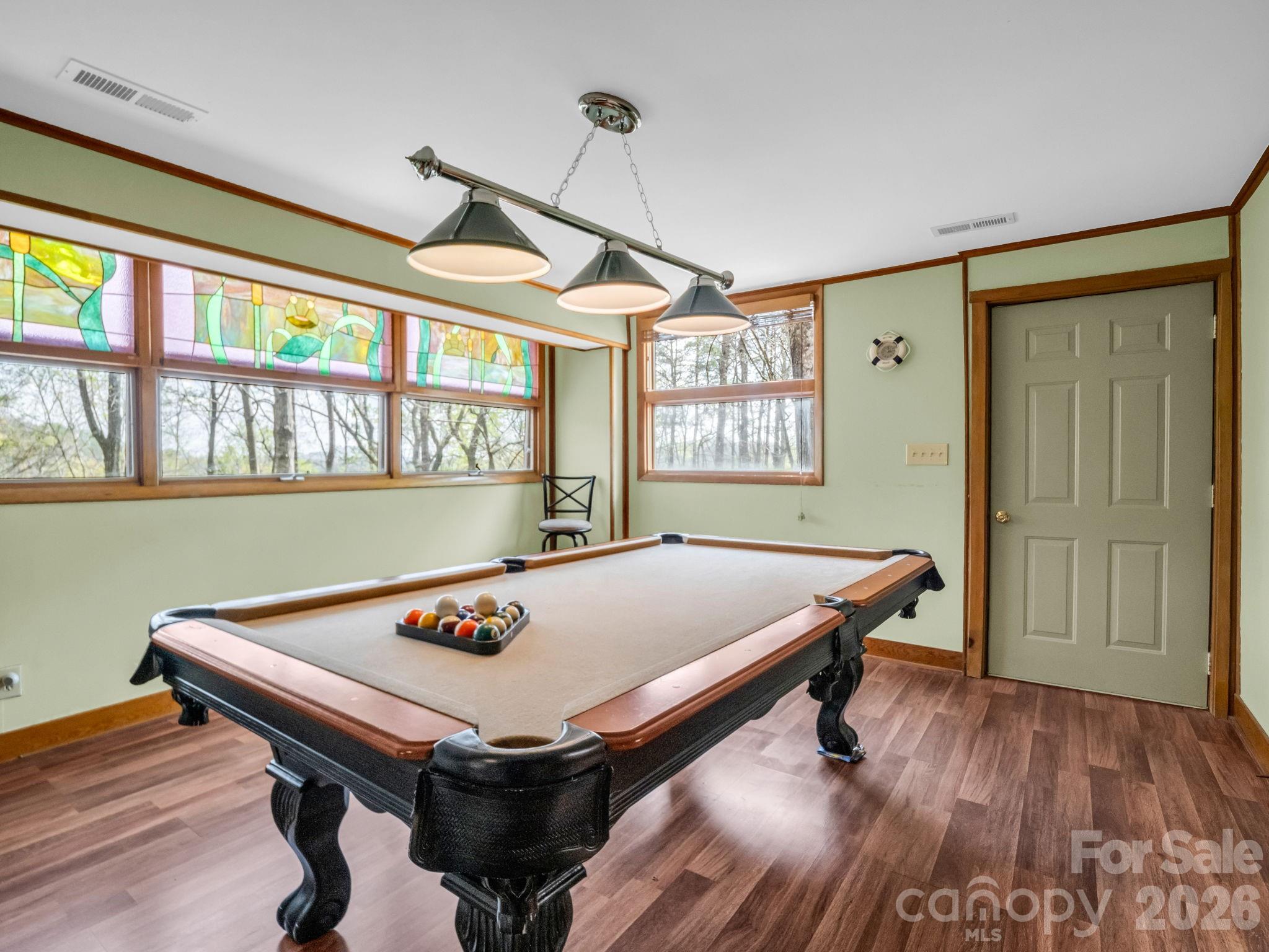 307 Watership Road Lake Lure, NC 28746 - Photo 26 of 48 a room with pool table and windows
