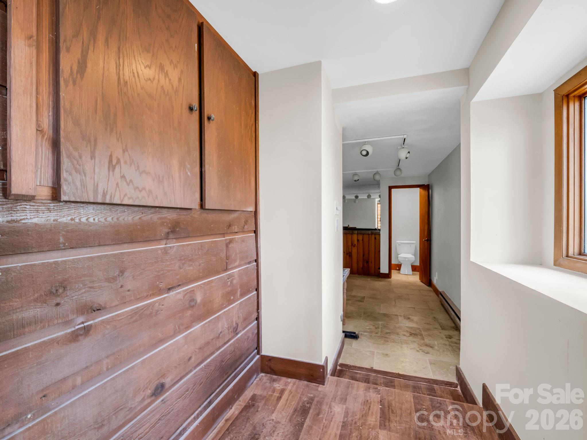 307 Watership Road Lake Lure, NC 28746 - Photo 32 of 48 a view of a hallway with wooden floor and entryway