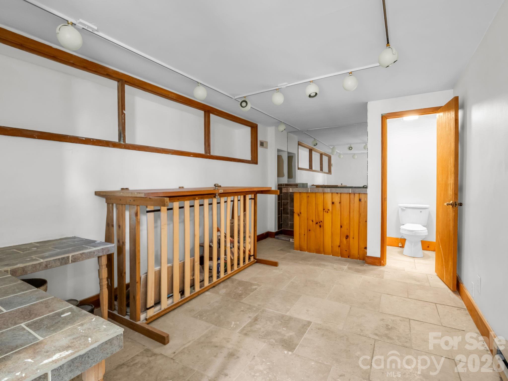 307 Watership Road Lake Lure, NC 28746 - Photo 33 of 48 a view of a hallway with a door