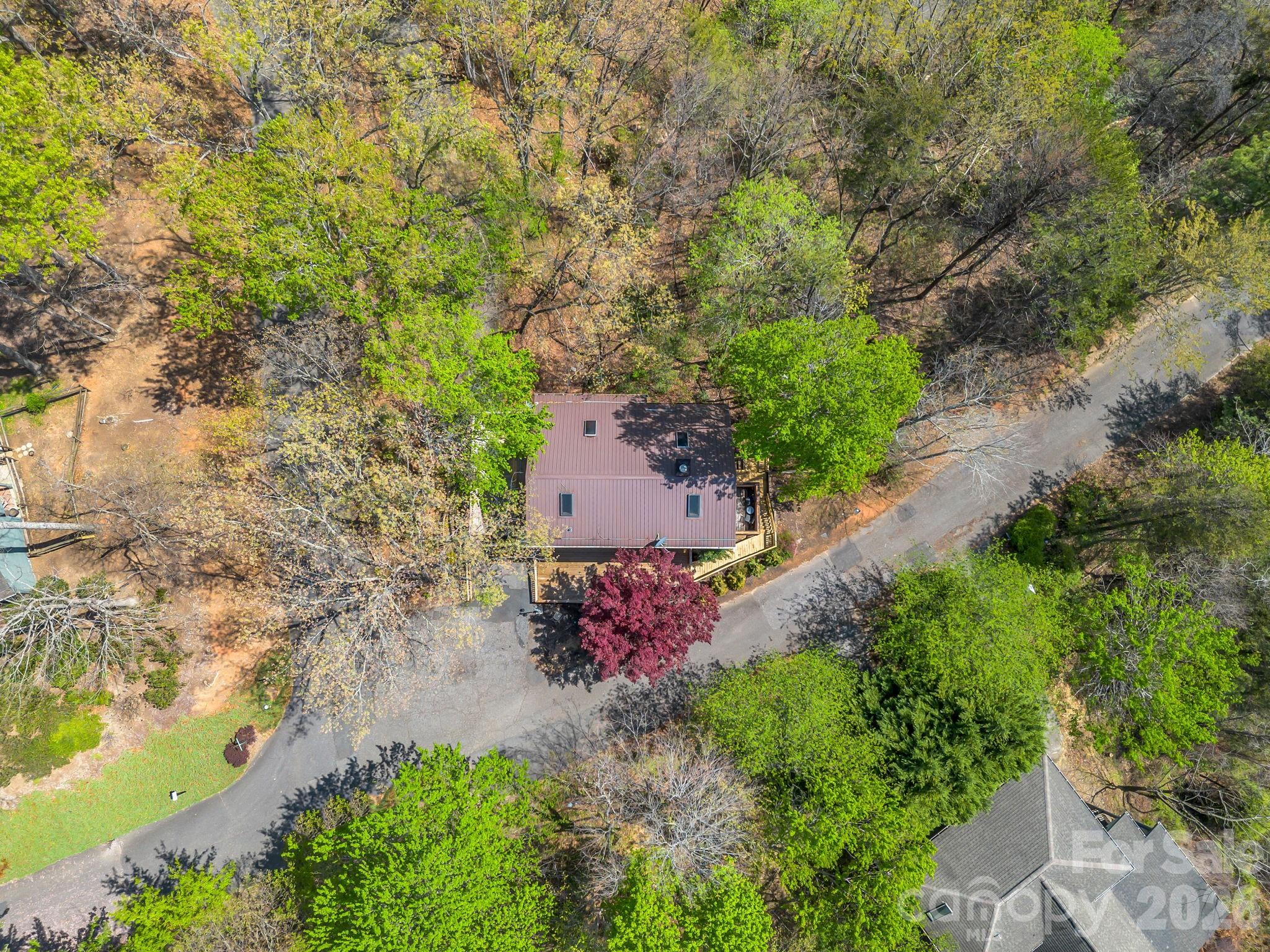 307 Watership Road Lake Lure, NC 28746 - Photo 39 of 48 an aerial view of a house with a yard