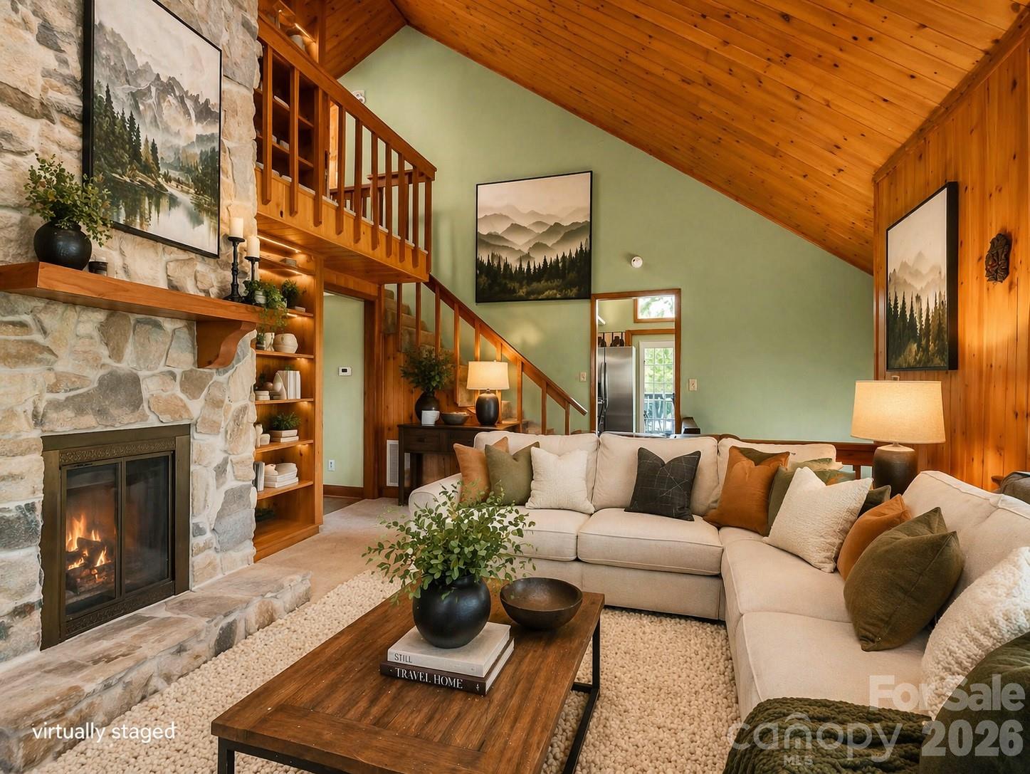 307 Watership Road Lake Lure, NC 28746 - Photo 5 of 48 a living room with furniture fireplace and a fireplace