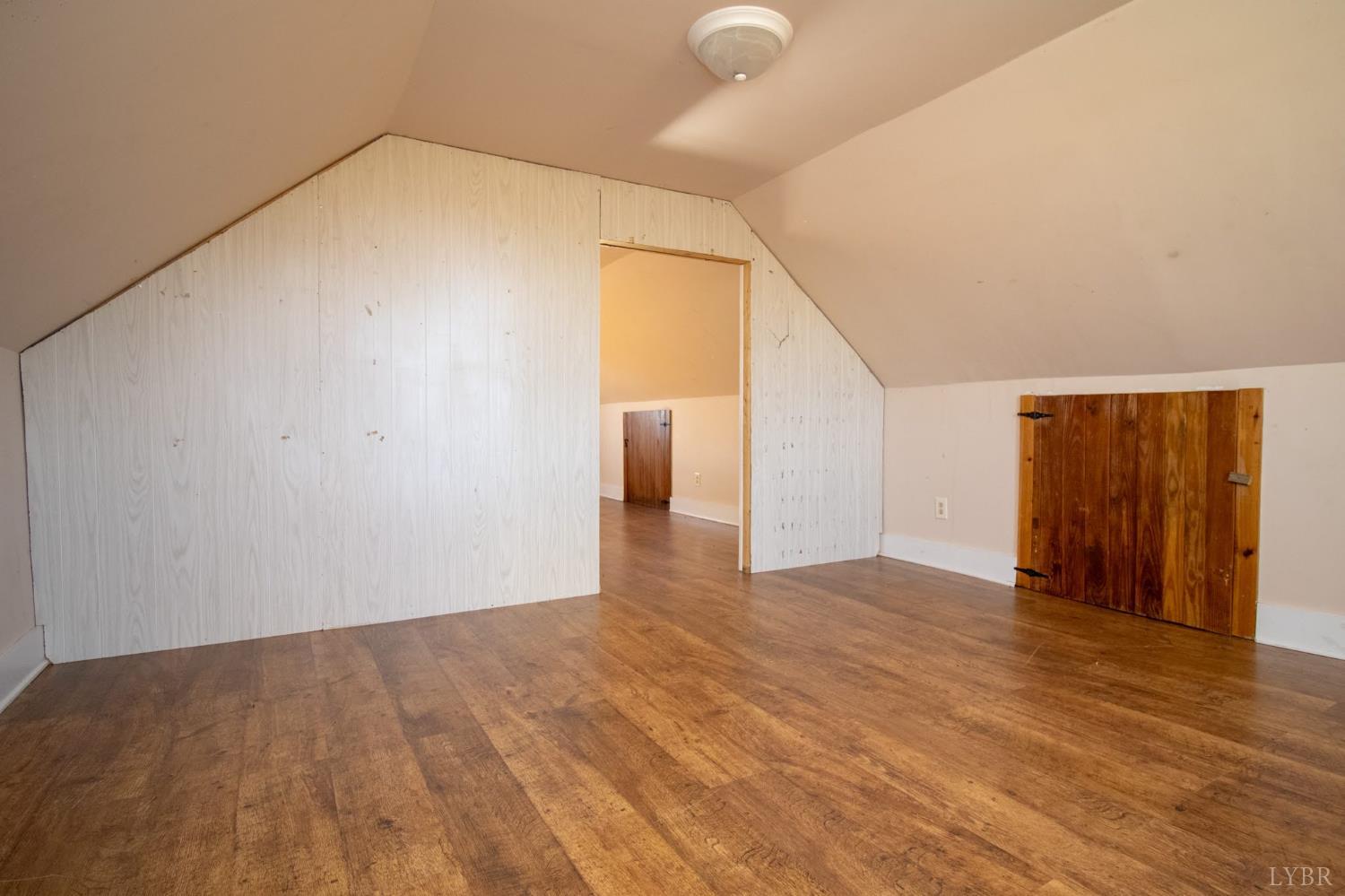 3039 T N Snow Road Nathalie, VA 24577 - Photo 26 of 50 a view of an empty room with wooden floor