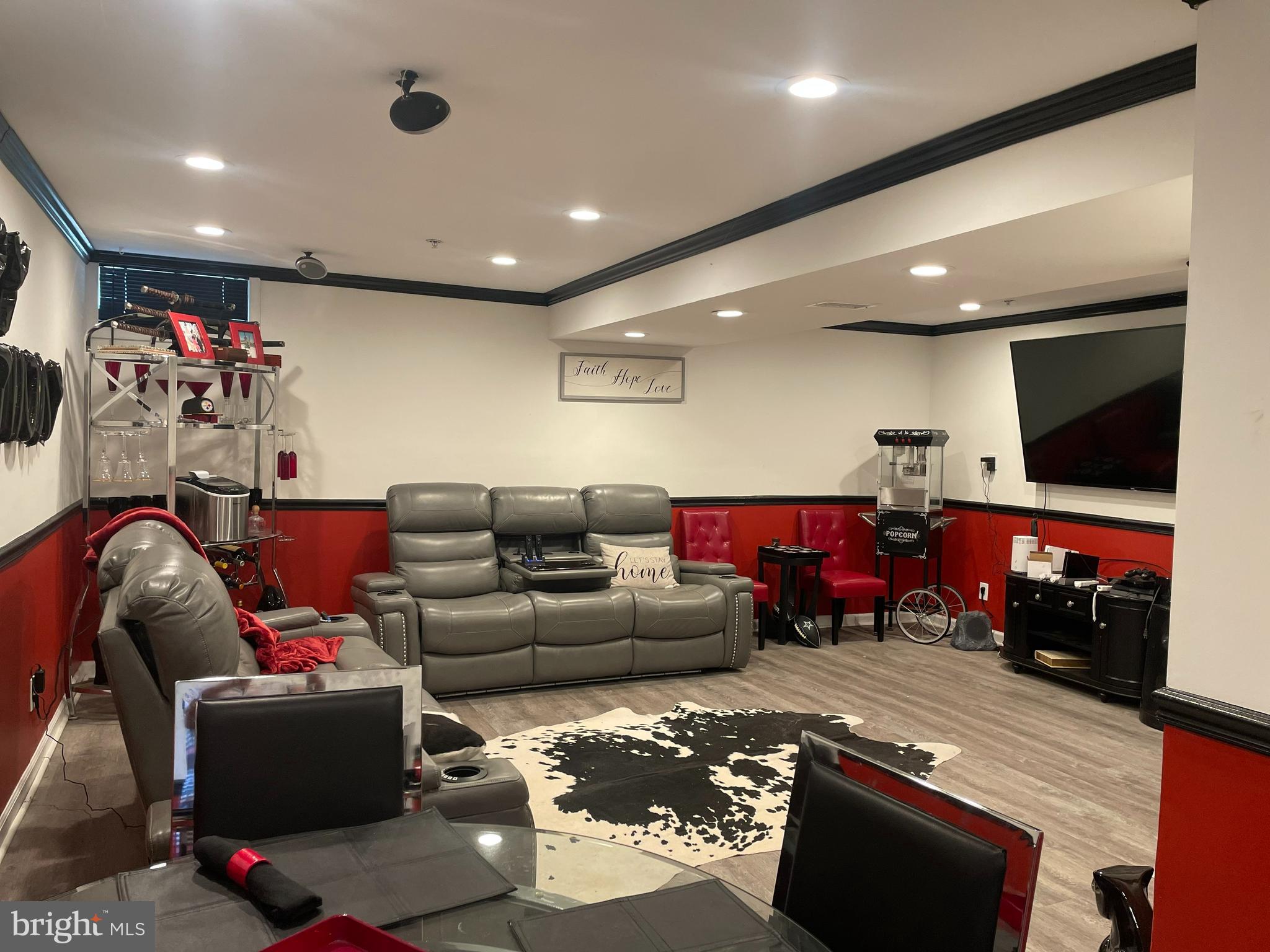 6106 Modupeola Way Capitol Heights, MD 20743 - Photo 25 of 32 Basement Picturs with TV and Game Nite