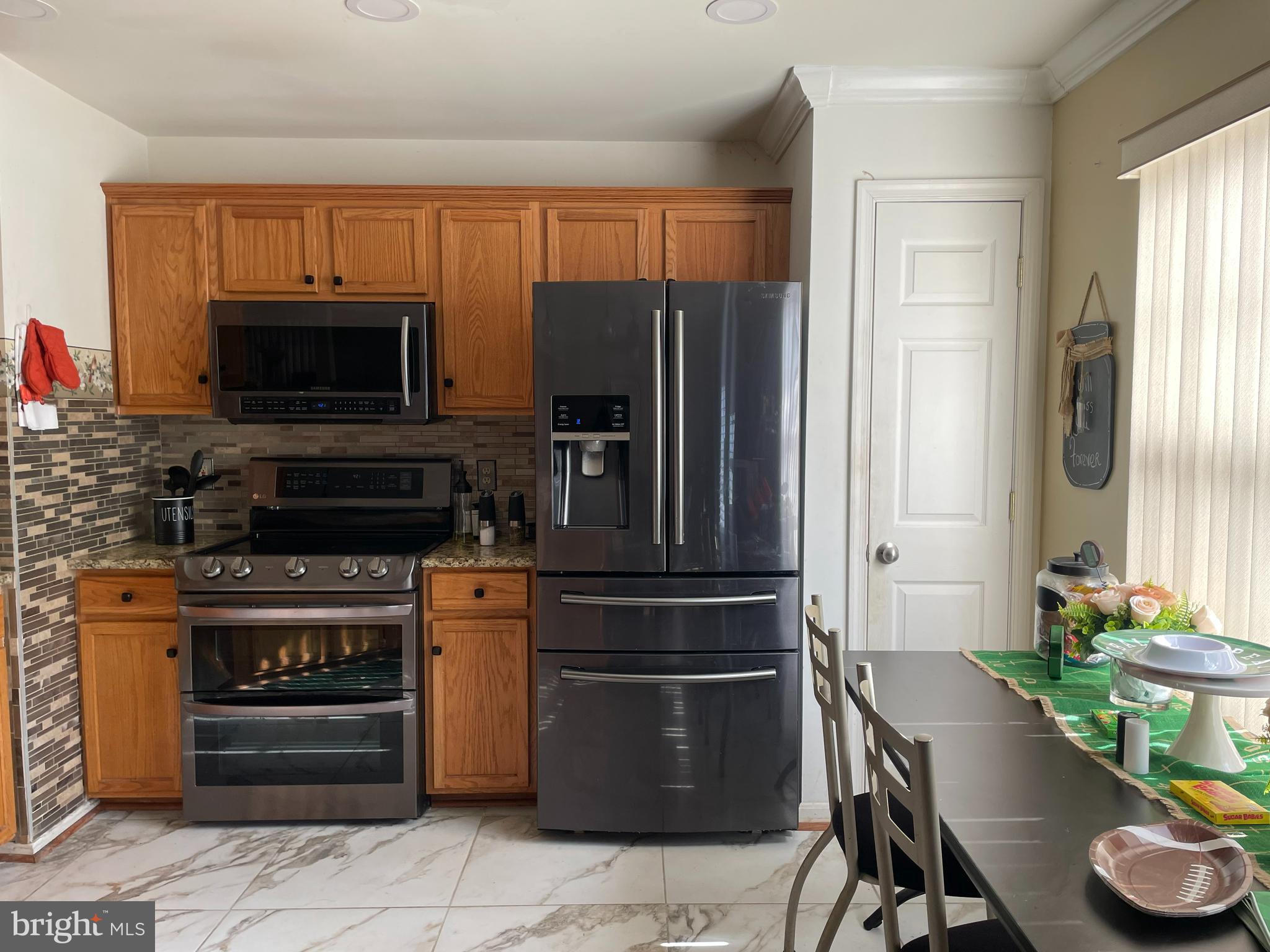 6106 Modupeola Way Capitol Heights, MD 20743 - Photo 6 of 32 Gourmet Kitchen with Stainless Steel Appliances