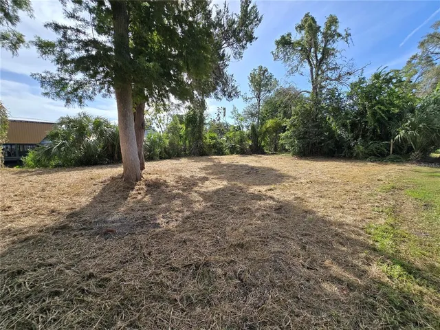 a view of a patio with a garden