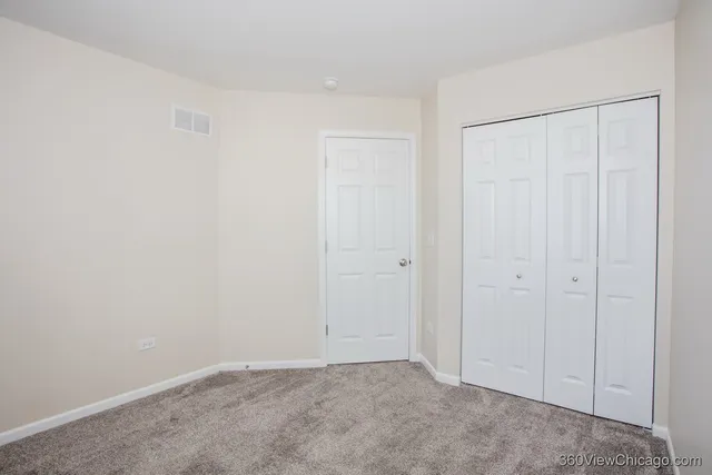 a view of a room with a window