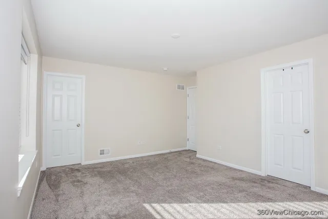 a view of a room with a window