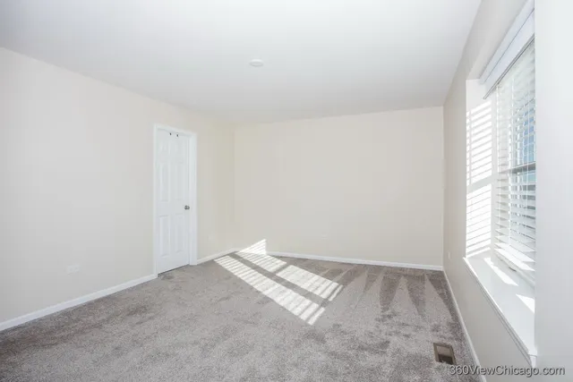 a bathroom with a sink double vanity and a shower