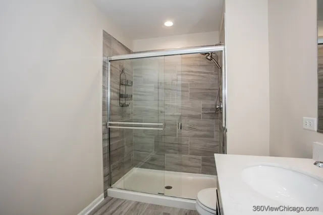 a view of balcony with wooden floor