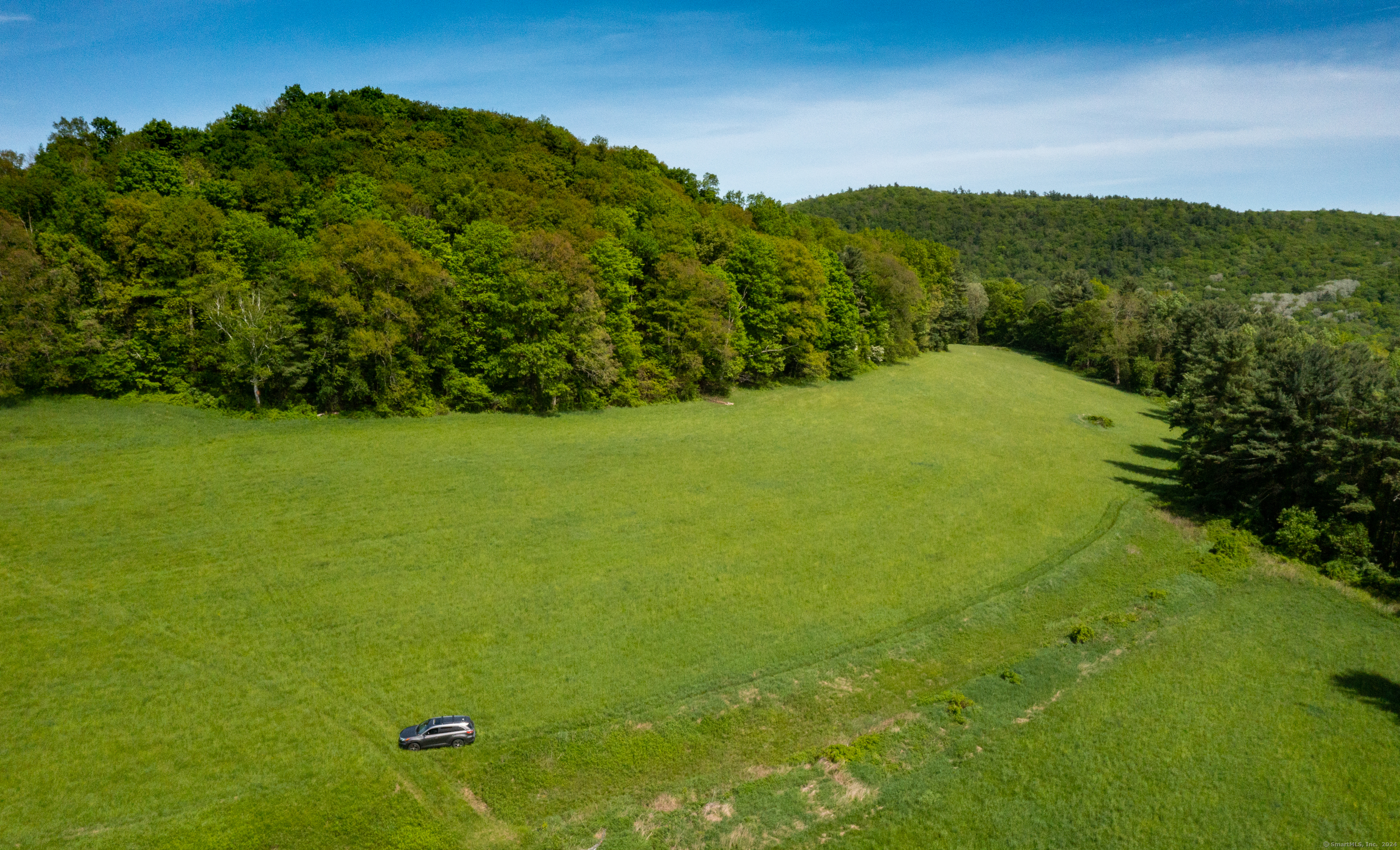 198-2 Beebe Hill Road Falls Village, CT 06031 - Photo 5 of 14 a view of a big yard with green space