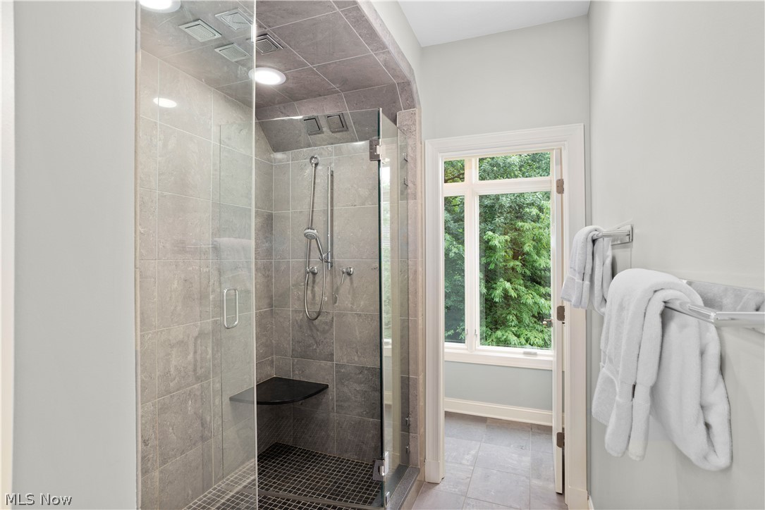 12480 Cedar Road, Unit 14 Cleveland, OH 44106 - Photo 18 of 35 Luxury shower with multiple showerheads and glass doors. Private water closet.