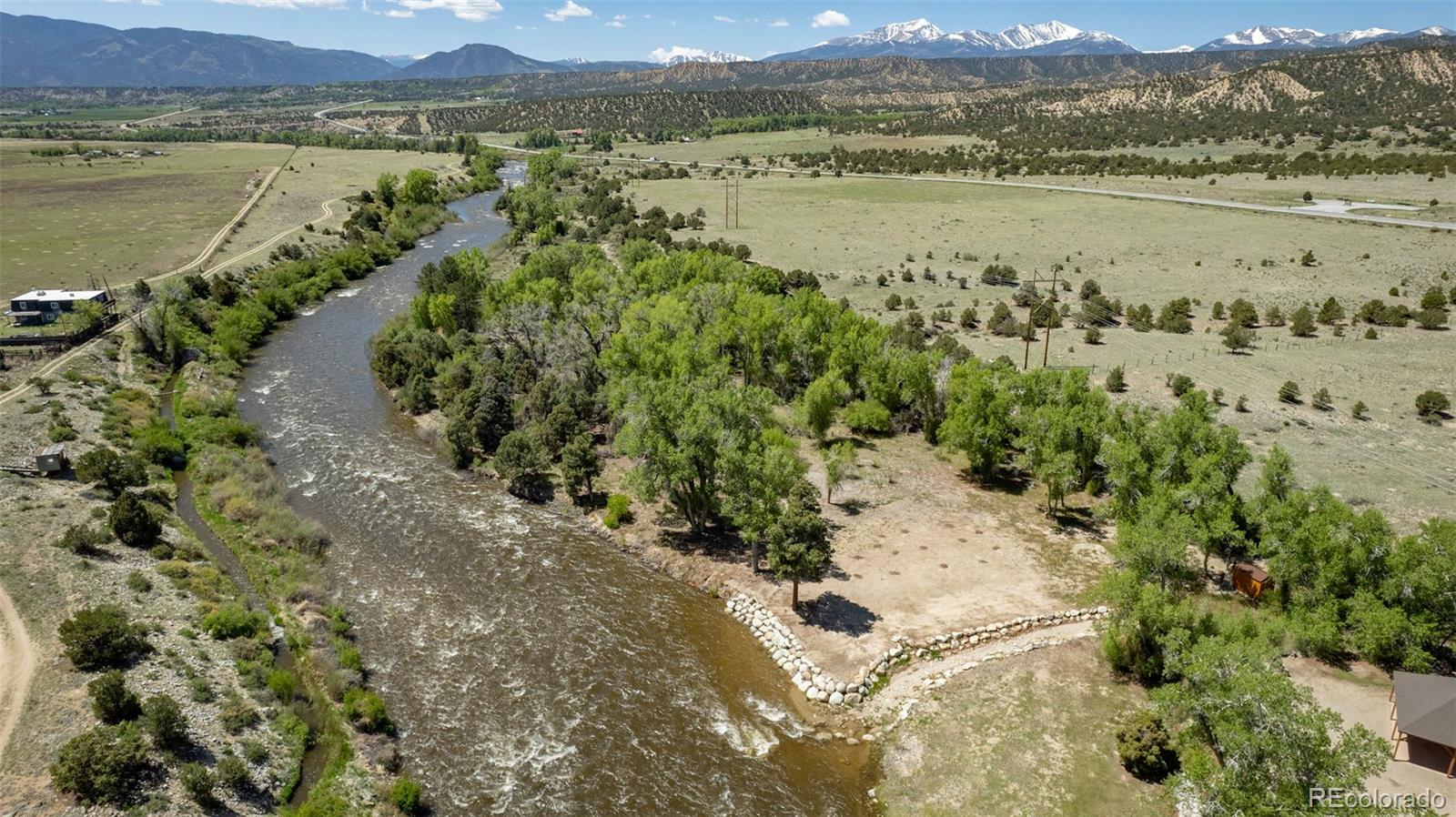 11033 Rivers Edge Lane Salida, CO 81201 - Photo 1 of 48 a view of a lake with a mountain
