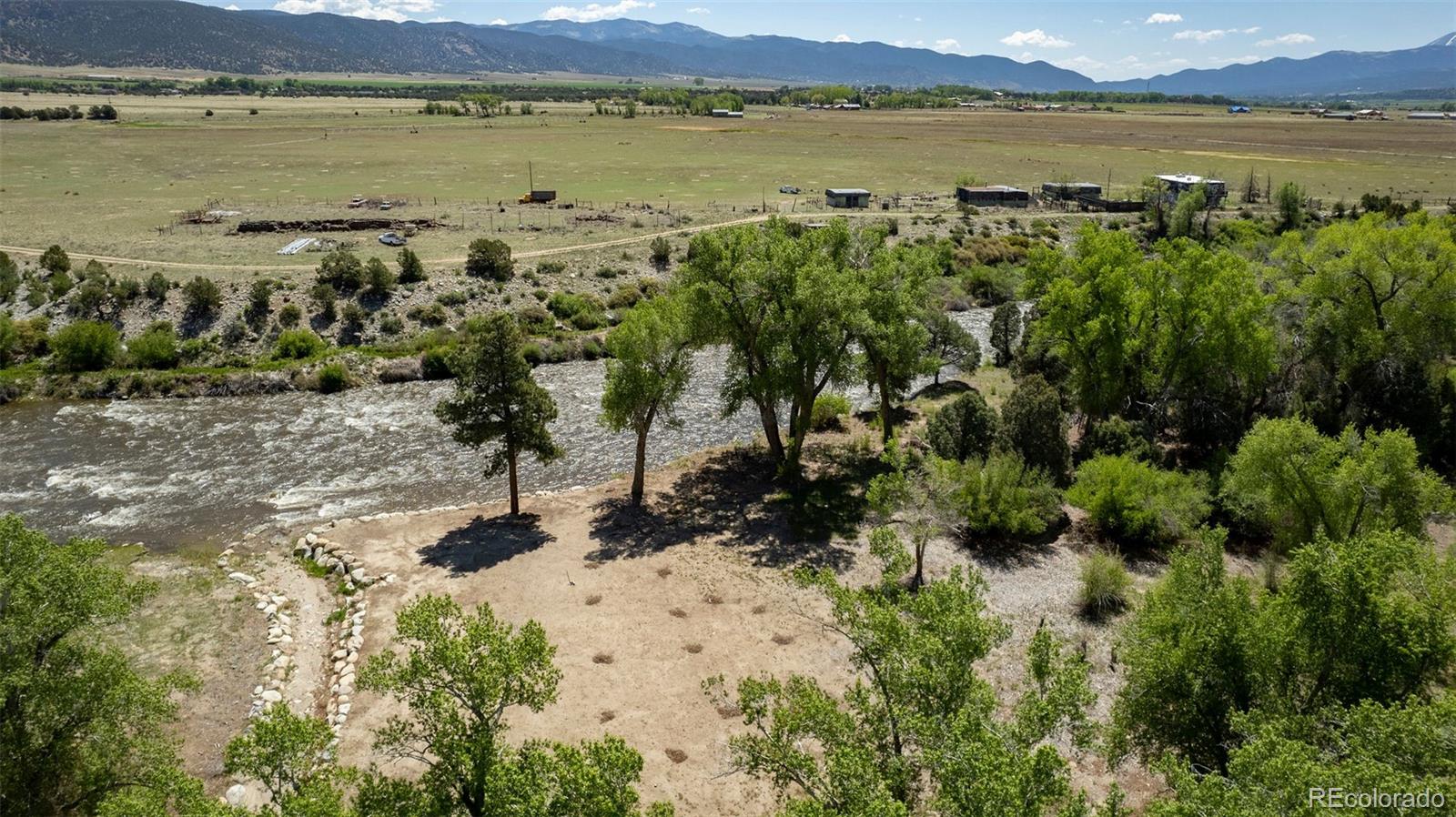 11033 Rivers Edge Lane Salida, CO 81201 - Photo 15 of 48 a view of a lake with a mountain