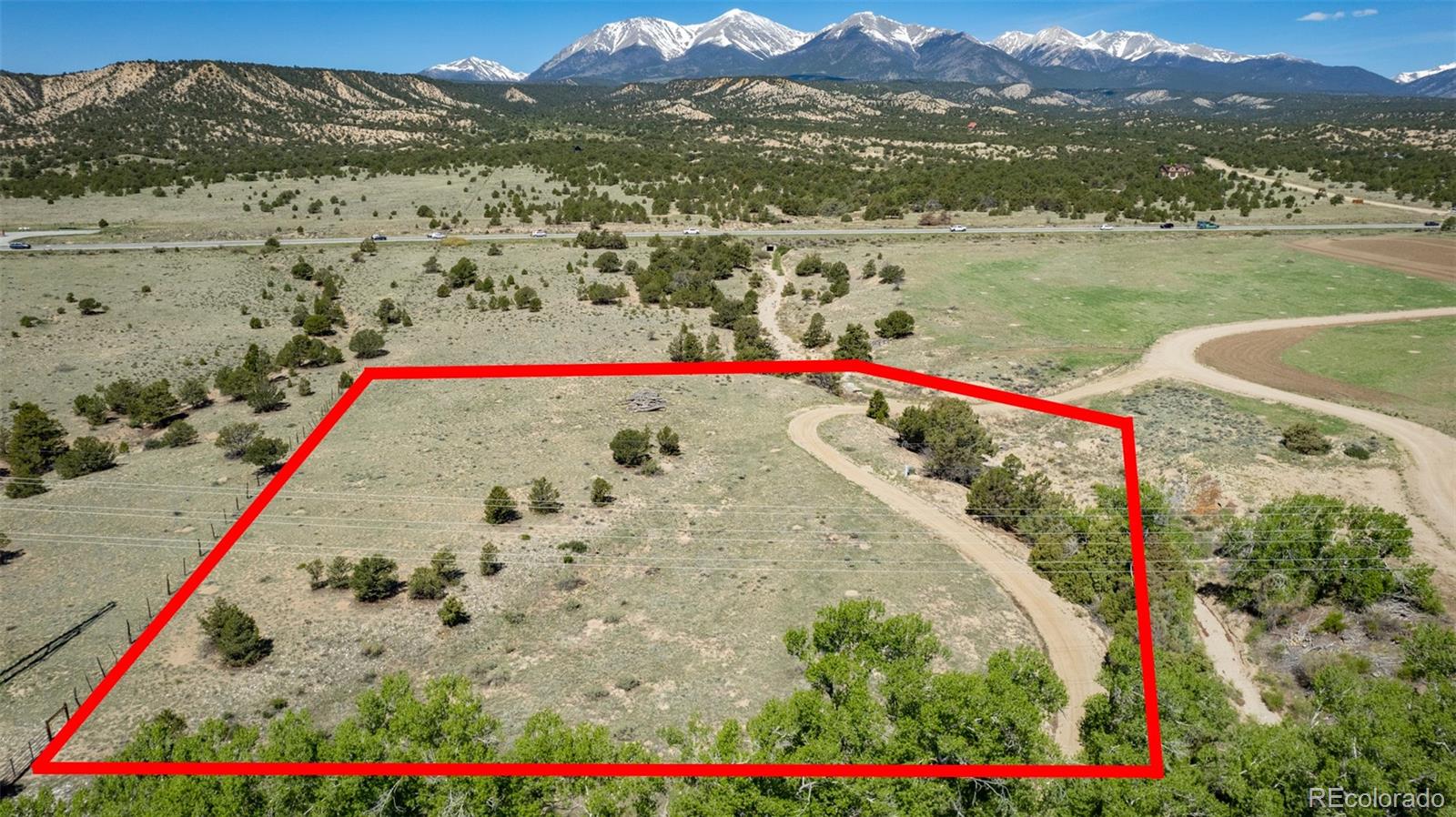 11033 Rivers Edge Lane Salida, CO 81201 - Photo 19 of 48 a view of swimming pool with a lake and mountain view