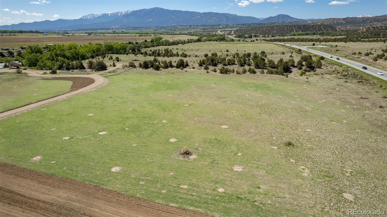 11033 Rivers Edge Lane Salida, CO 81201 - Photo 22 of 48 a view of a lake with a mountain