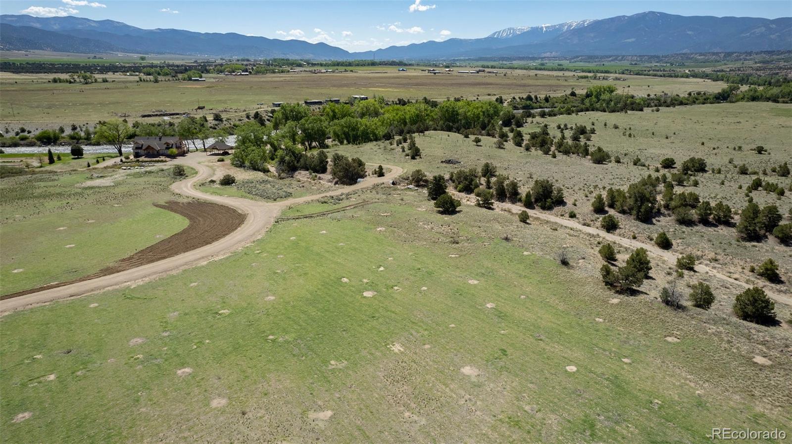 11033 Rivers Edge Lane Salida, CO 81201 - Photo 24 of 48 a view of a lake with a mountain