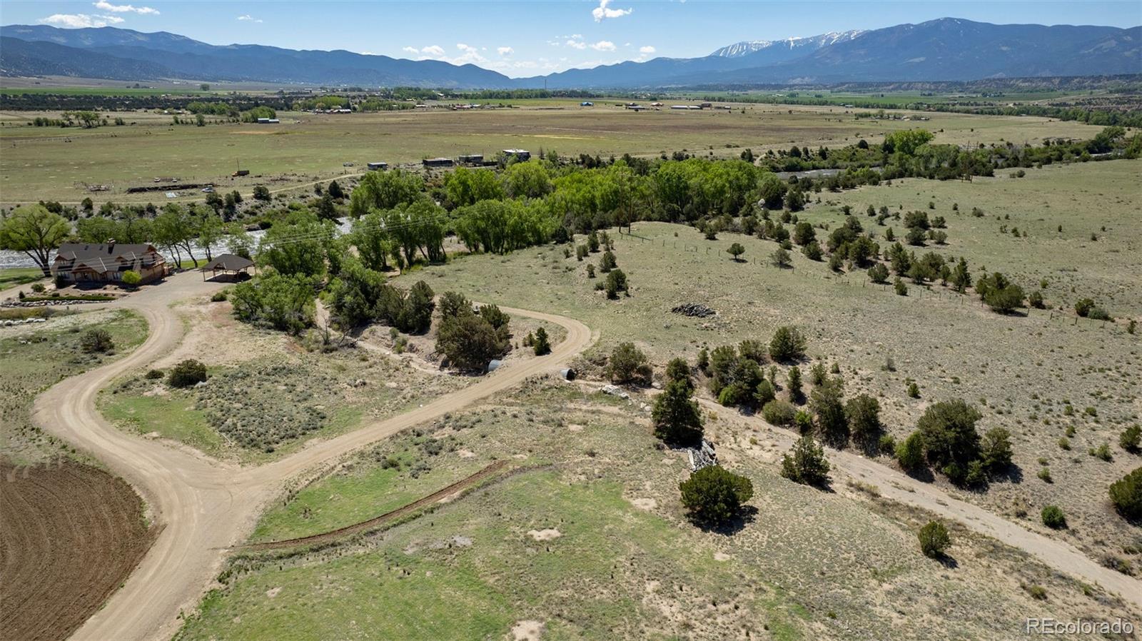 11033 Rivers Edge Lane Salida, CO 81201 - Photo 25 of 48 a view of a lake with a mountain