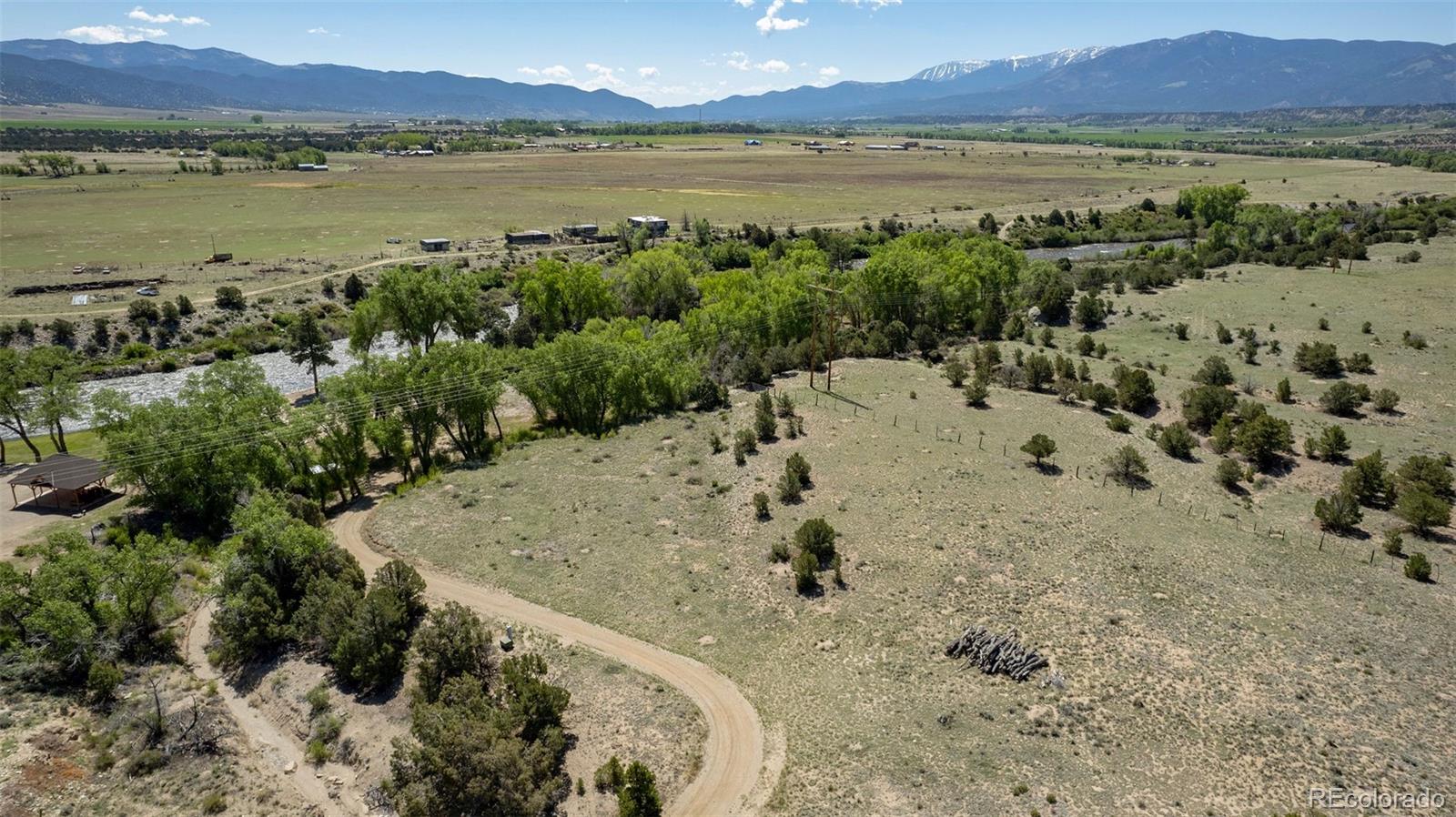 11033 Rivers Edge Lane Salida, CO 81201 - Photo 26 of 48 a view of a lake with a mountain
