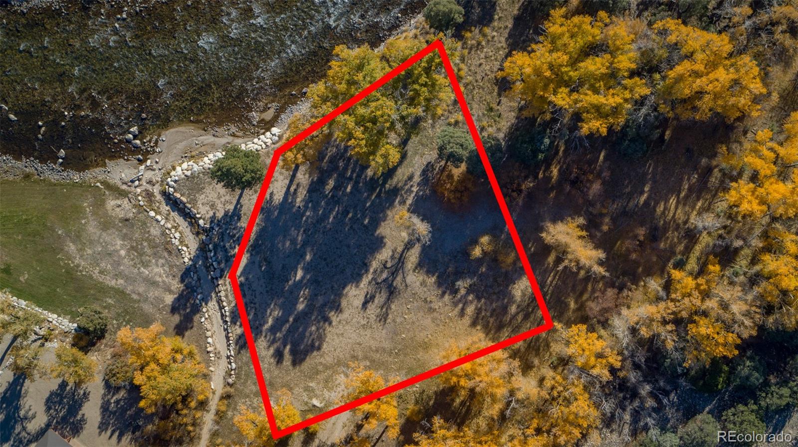 11033 Rivers Edge Lane Salida, CO 81201 - Photo 31 of 48 a view of a yard with a tree