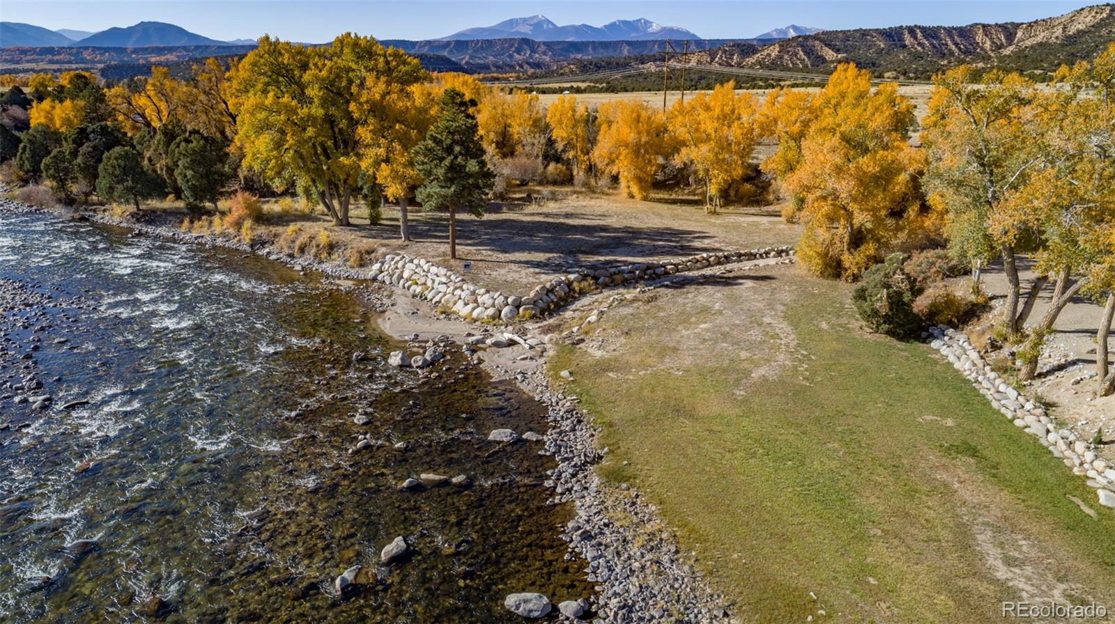11033 Rivers Edge Lane Salida, CO 81201 - Photo 42 of 48 a view of a yard with wooden fence