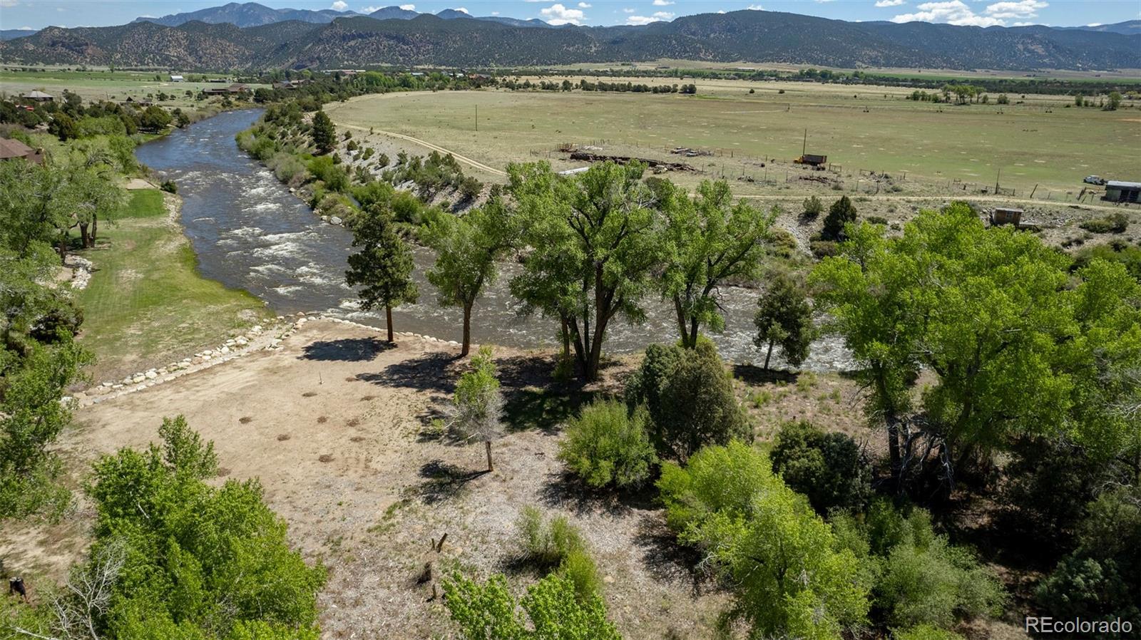 11033 Rivers Edge Lane Salida, CO 81201 - Photo 5 of 48 a view of a lake with a mountain