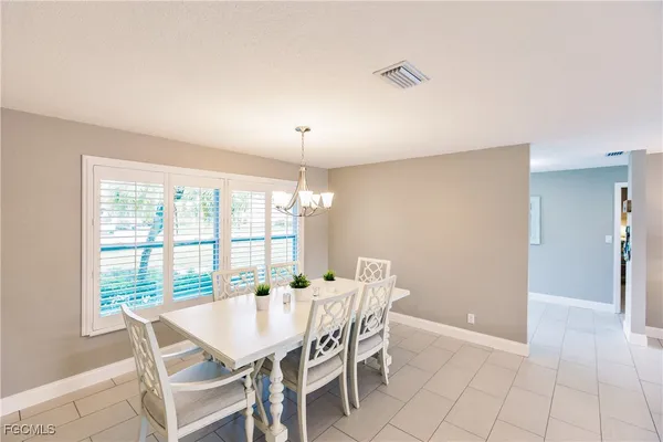 a view of a dining room with furniture