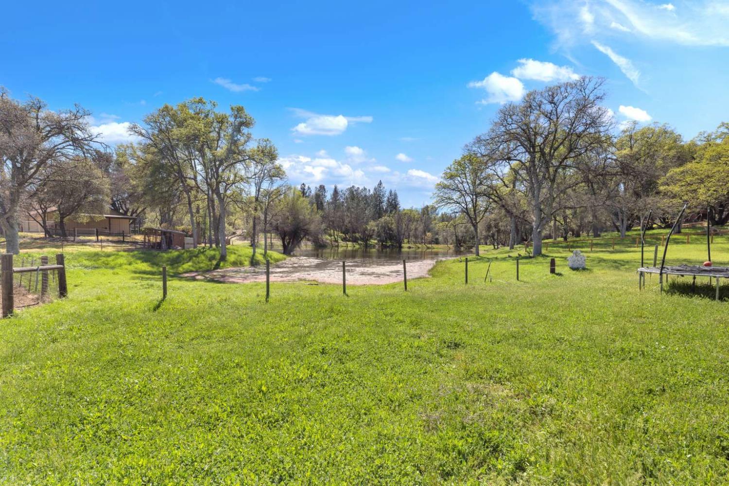 13489 Yorkshire Road Groveland, CA 95321 - Photo 34 of 35 a view of a park with swings and slides
