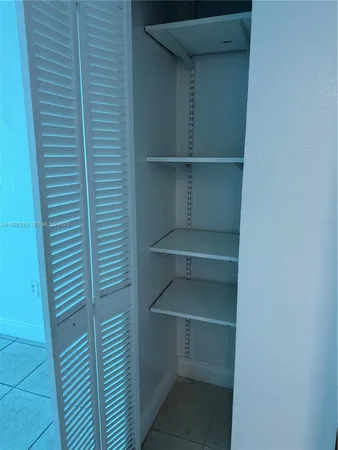 a view of a room with rack on the wall