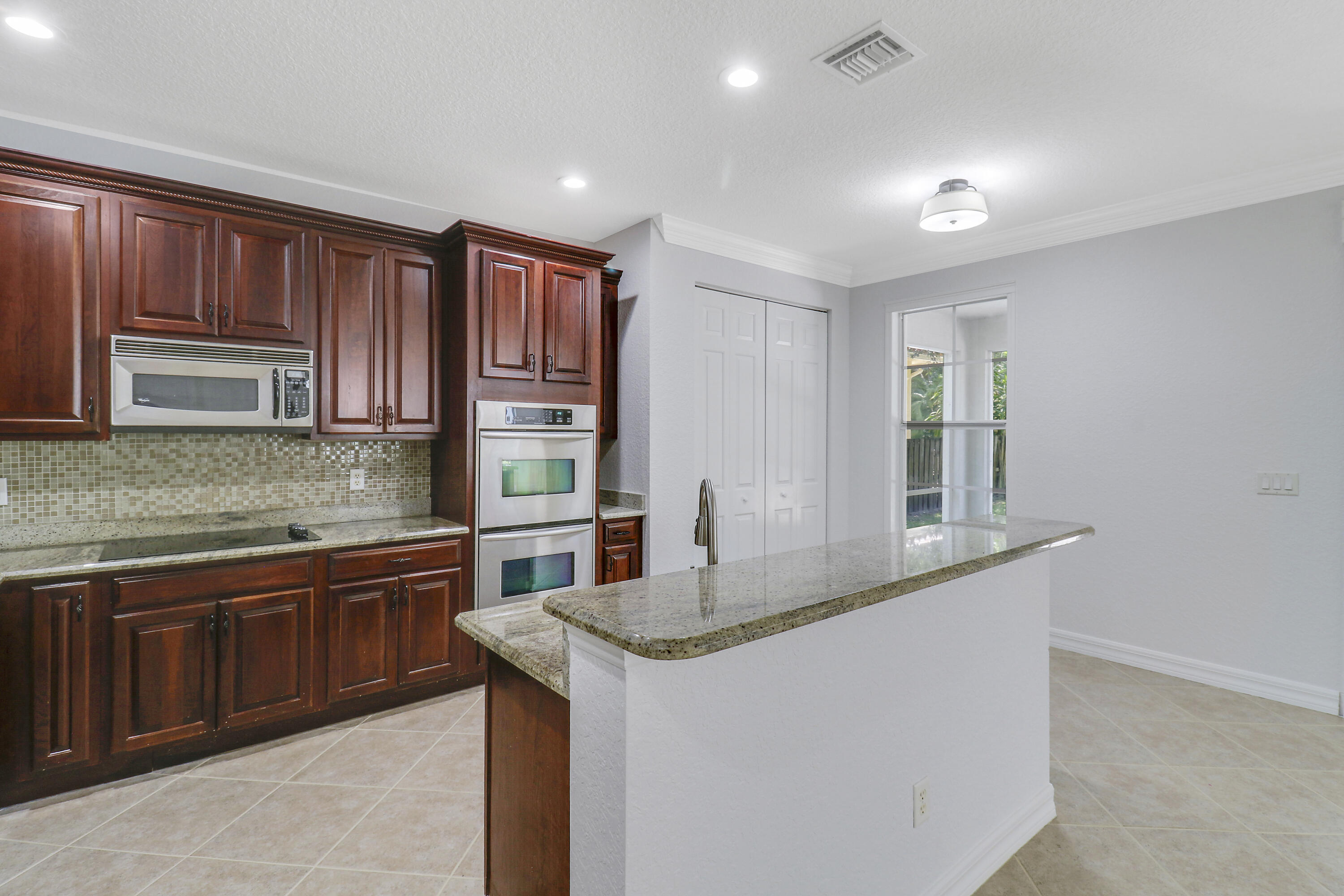 112 Dunmore Drive Jupiter, FL 33458 - Photo 9 of 43 Kitchen has 2 Dishwashers