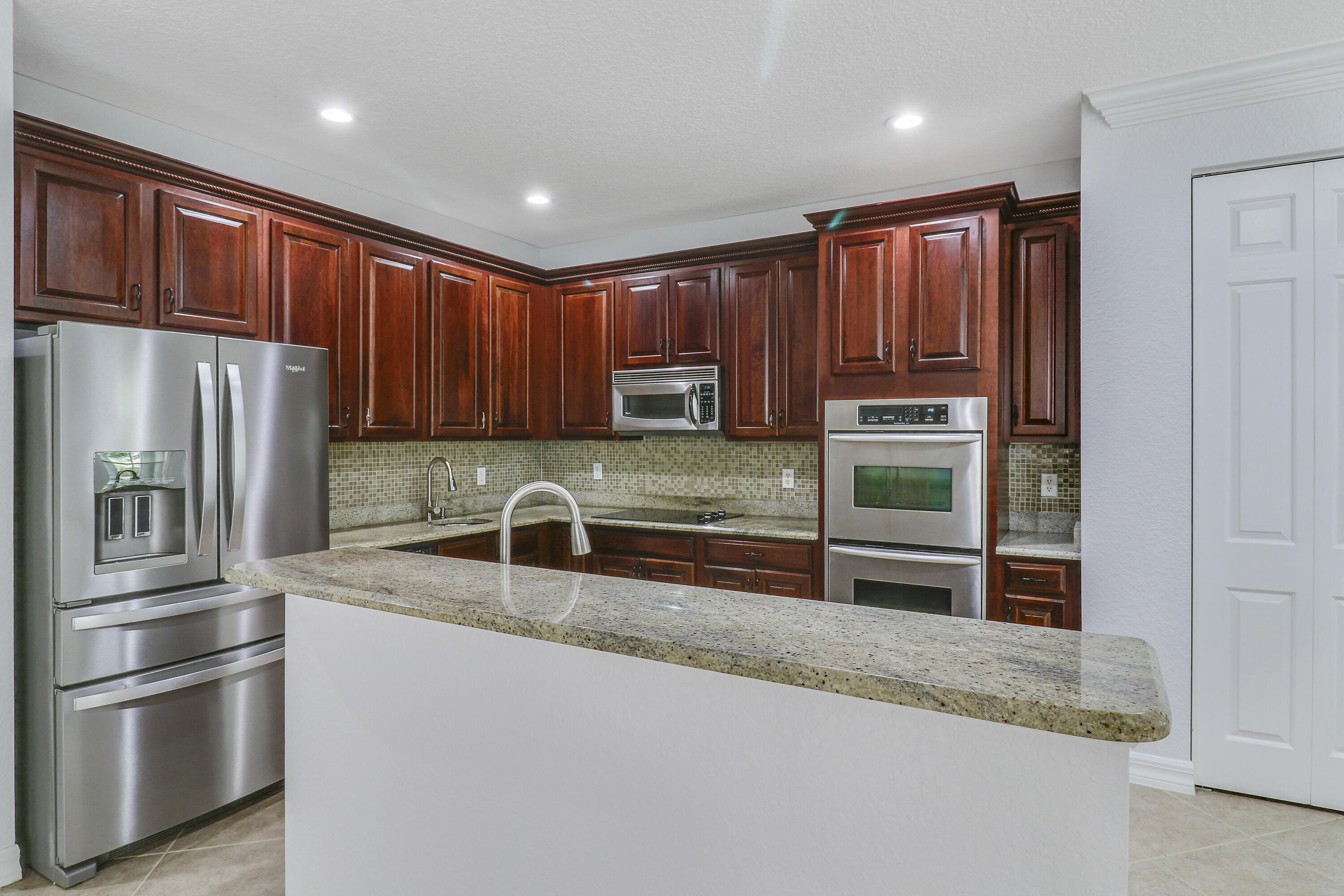 112 Dunmore Drive Jupiter, FL 33458 - Photo 10 of 43 Double Oven and New Refrigerator