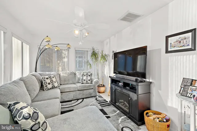a bathroom with a sink a mirror and a shower