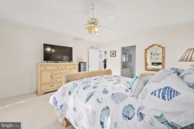 a view of a deck with a chair and wooden floor