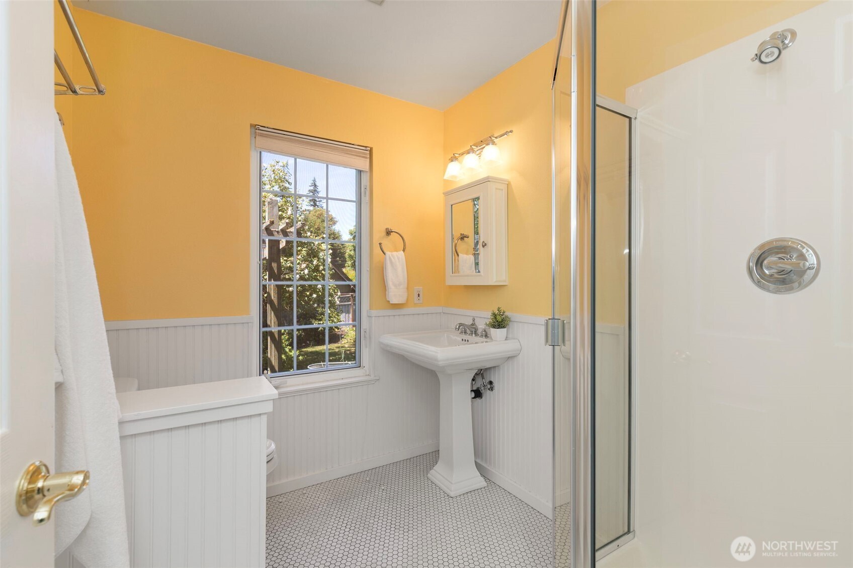1757 Maple Street Port Townsend, WA 98368 - Photo 34 of 40 a bathroom with a sink a toilet and shower