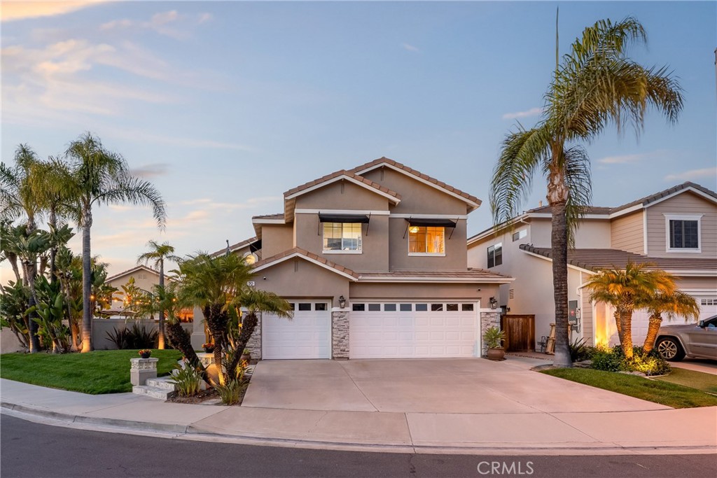 20 Beaulieu Lane Lake Forest, CA 92610 - Photo 1 of 1 a view of a house with a yard and palm trees