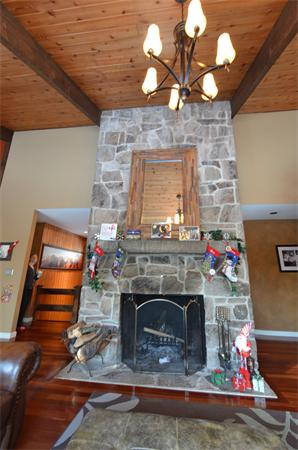 47 Pierpont Road Dudley, MA 01571 - Photo 14 of 30 a room with fireplace and wooden floor