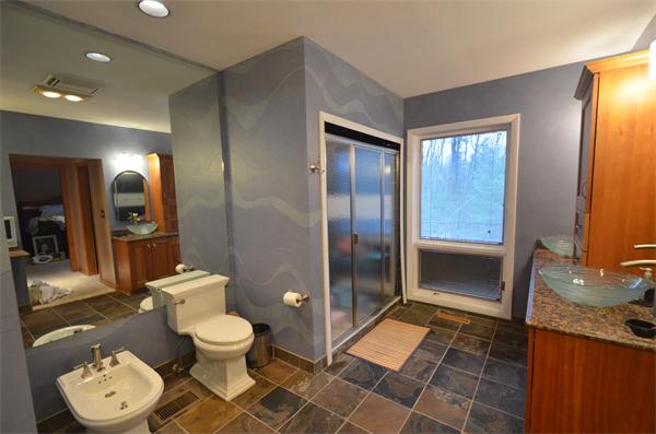 47 Pierpont Road Dudley, MA 01571 - Photo 19 of 30 a bathroom with a sink and a mirror