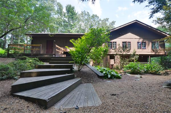 47 Pierpont Road Dudley, MA 01571 - Photo 3 of 30 a house with trees in the background
