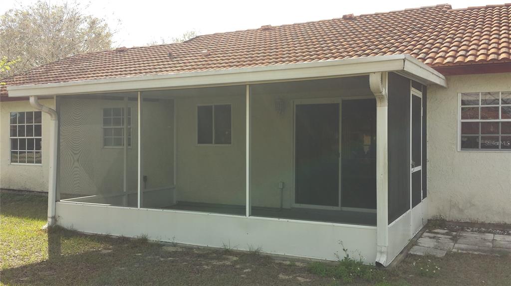 301 Oak Track Loop Ocala, FL 34472 - Photo 14 of 14 a front view of a house