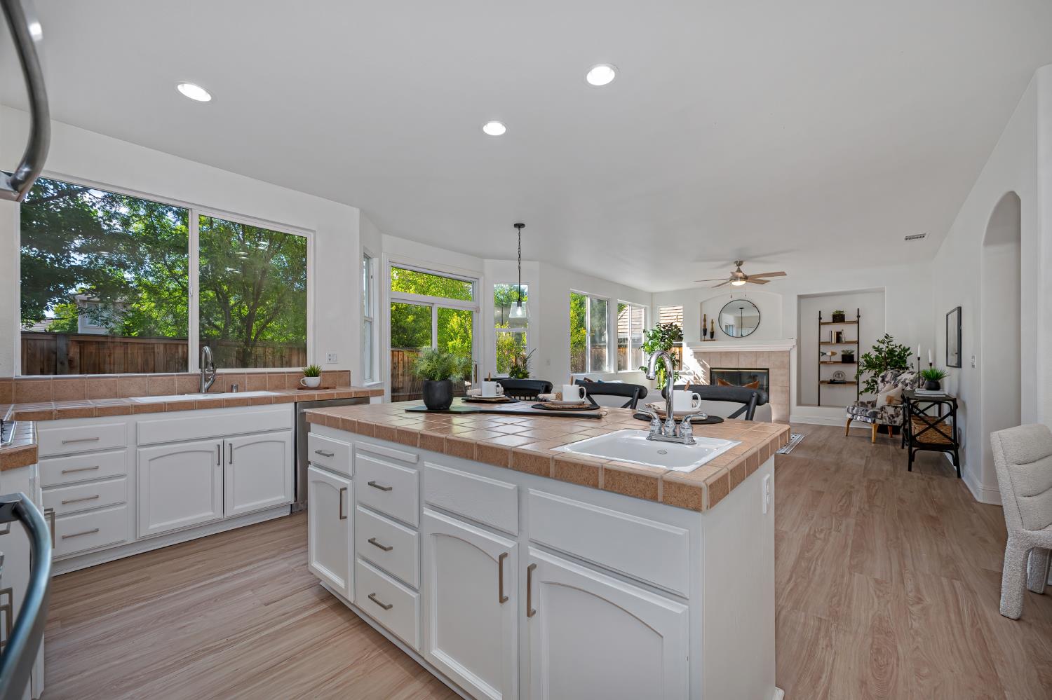 820 Travis Street Folsom, CA 95630 - Photo 11 of 47 a kitchen with sink stove and wooden floor