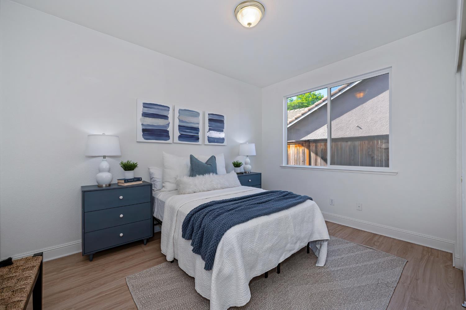 820 Travis Street Folsom, CA 95630 - Photo 21 of 47 a bedroom with a bed and a window