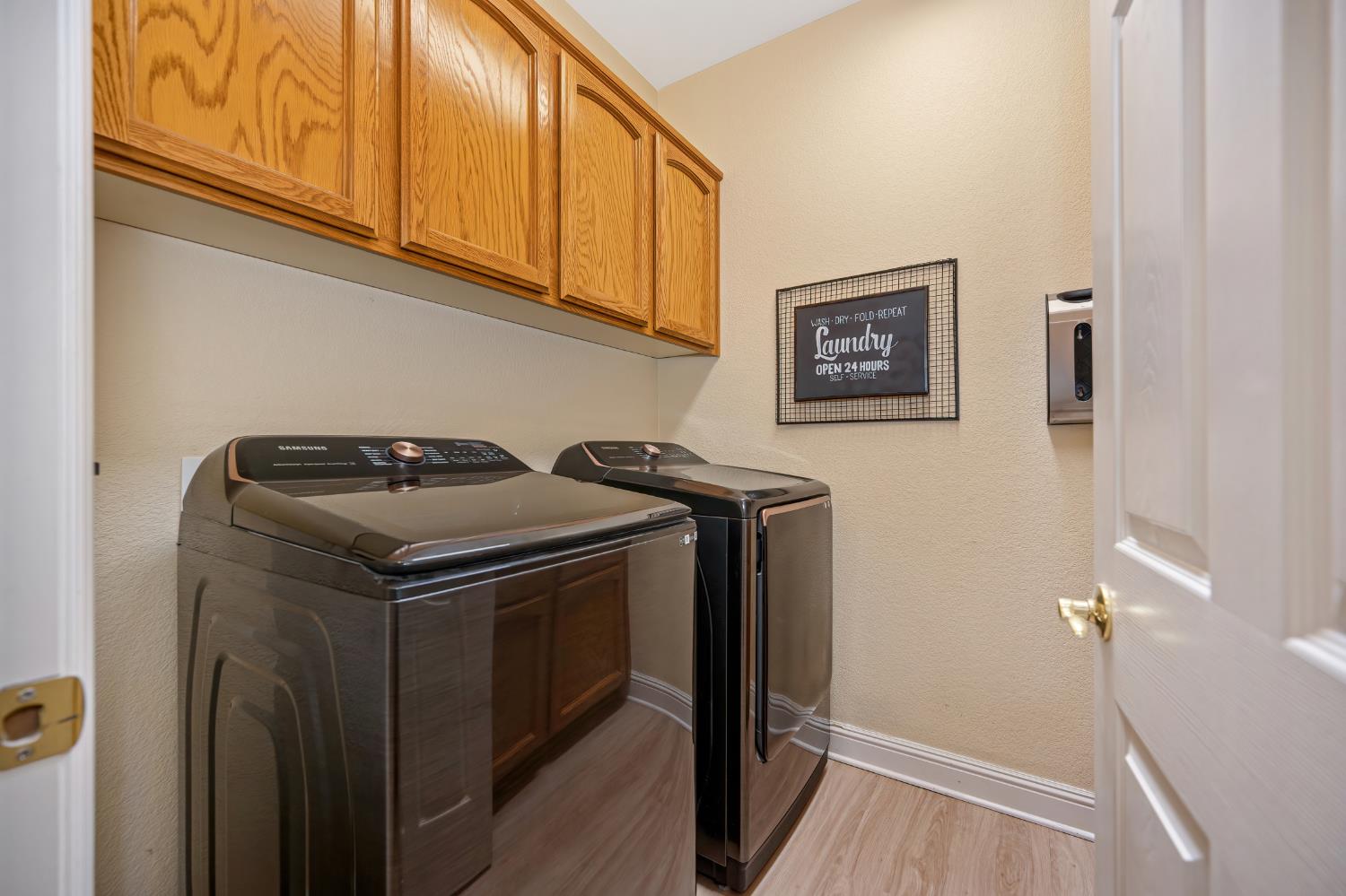 820 Travis Street Folsom, CA 95630 - Photo 23 of 47 a utility room with dryer and washer