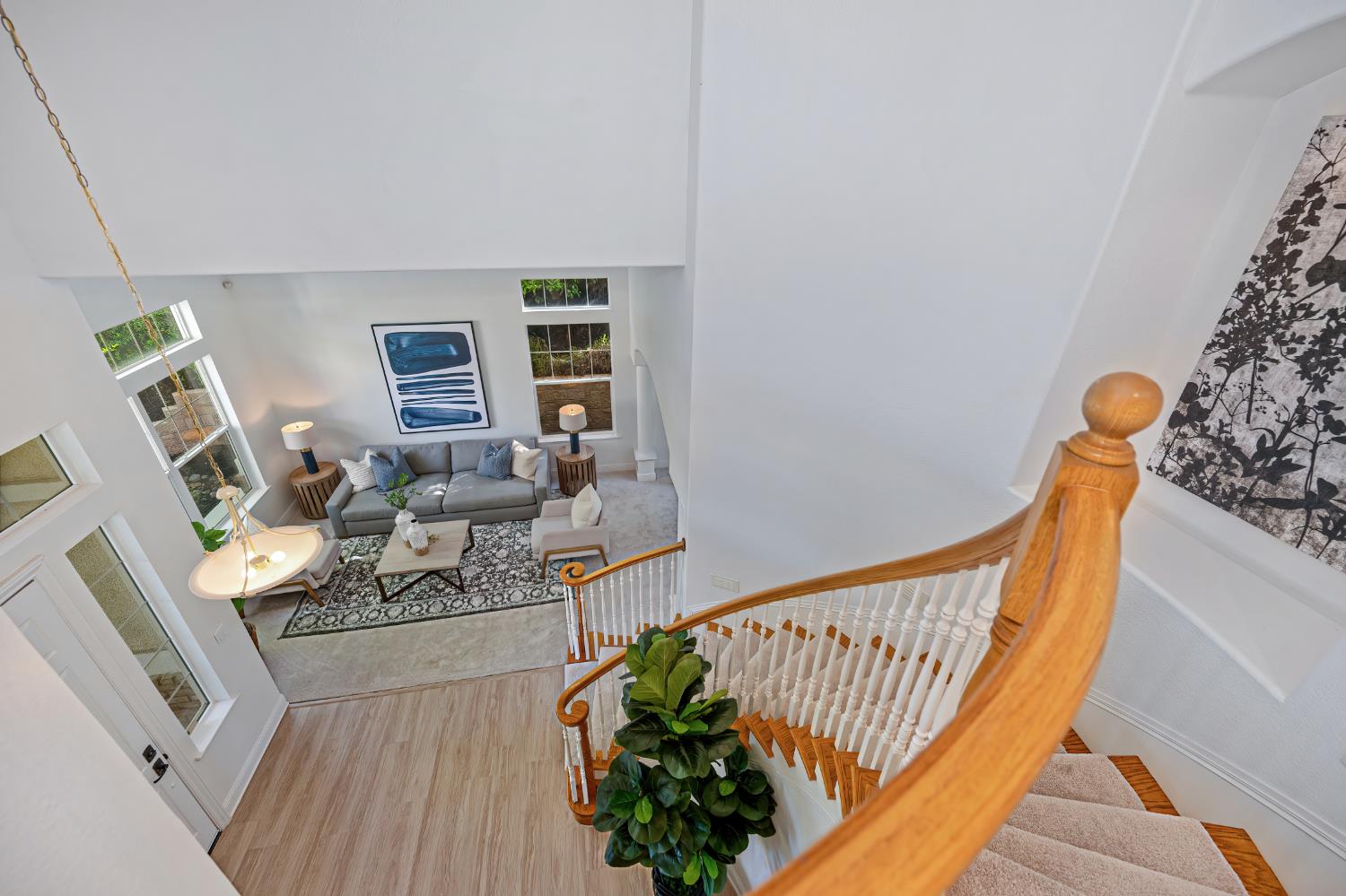 820 Travis Street Folsom, CA 95630 - Photo 26 of 47 a view of a living room with furniture wooden floor and windows