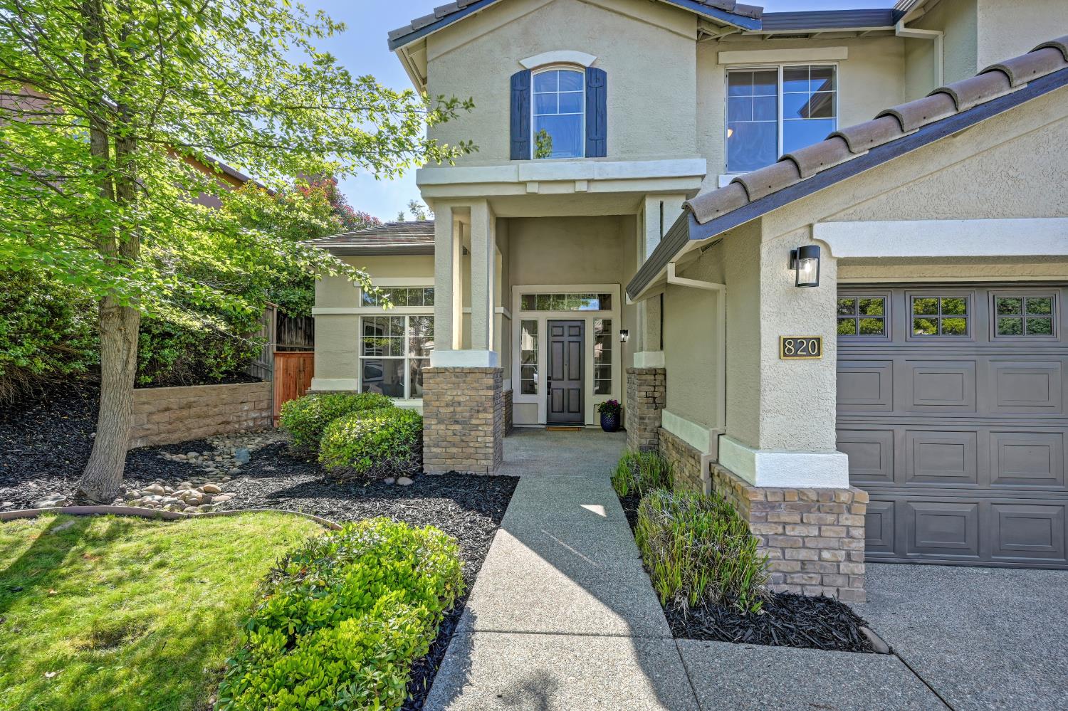 820 Travis Street Folsom, CA 95630 - Photo 3 of 47 a front view of a house with garden