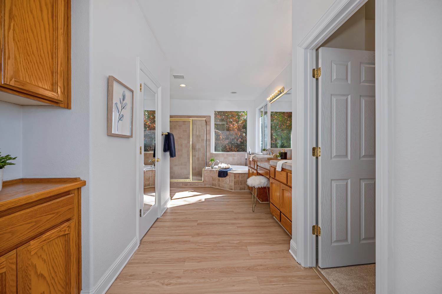 820 Travis Street Folsom, CA 95630 - Photo 31 of 47 a hallway with furniture and wooden floor