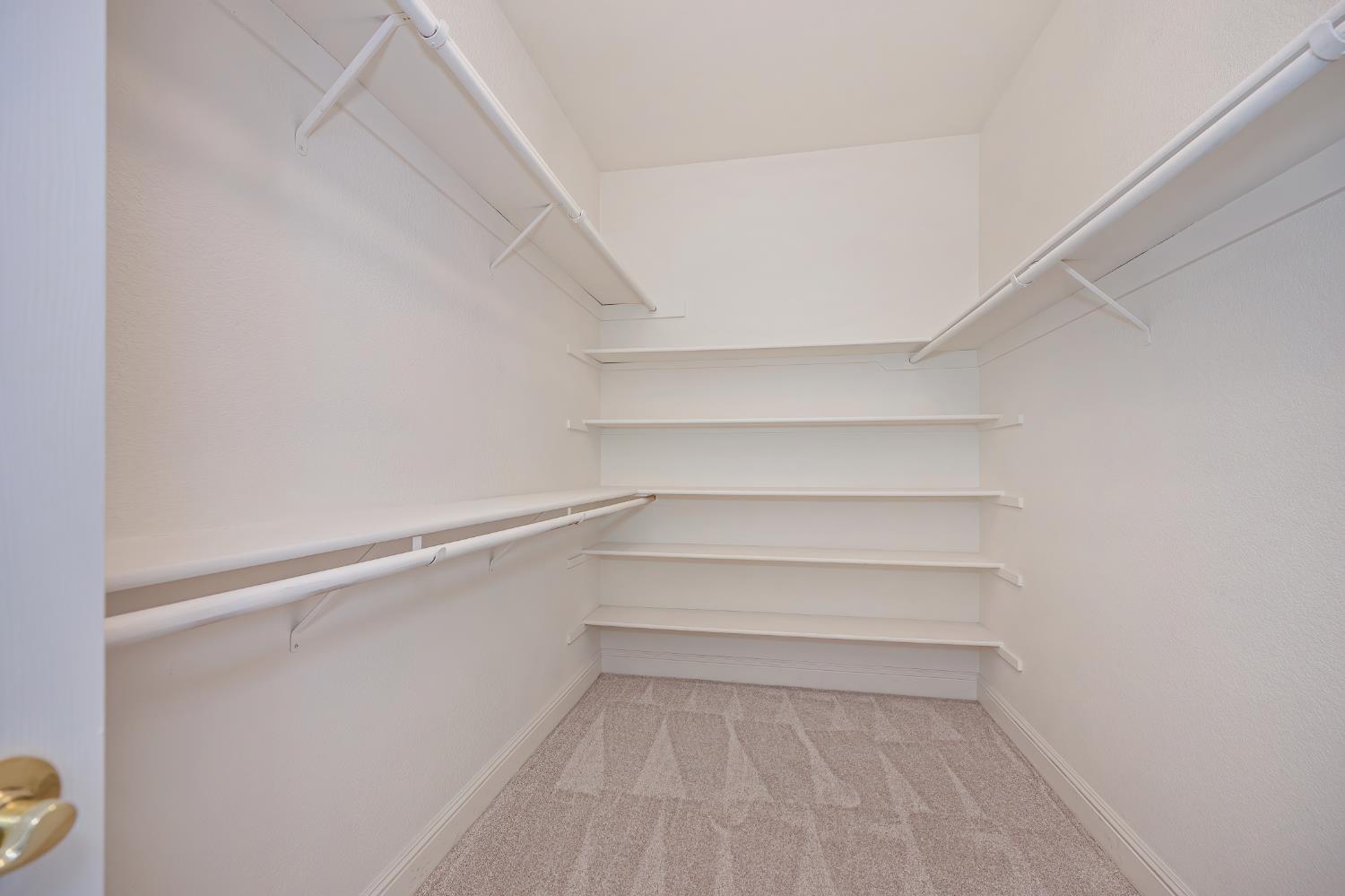 820 Travis Street Folsom, CA 95630 - Photo 34 of 47 a view of an empty walk in closet